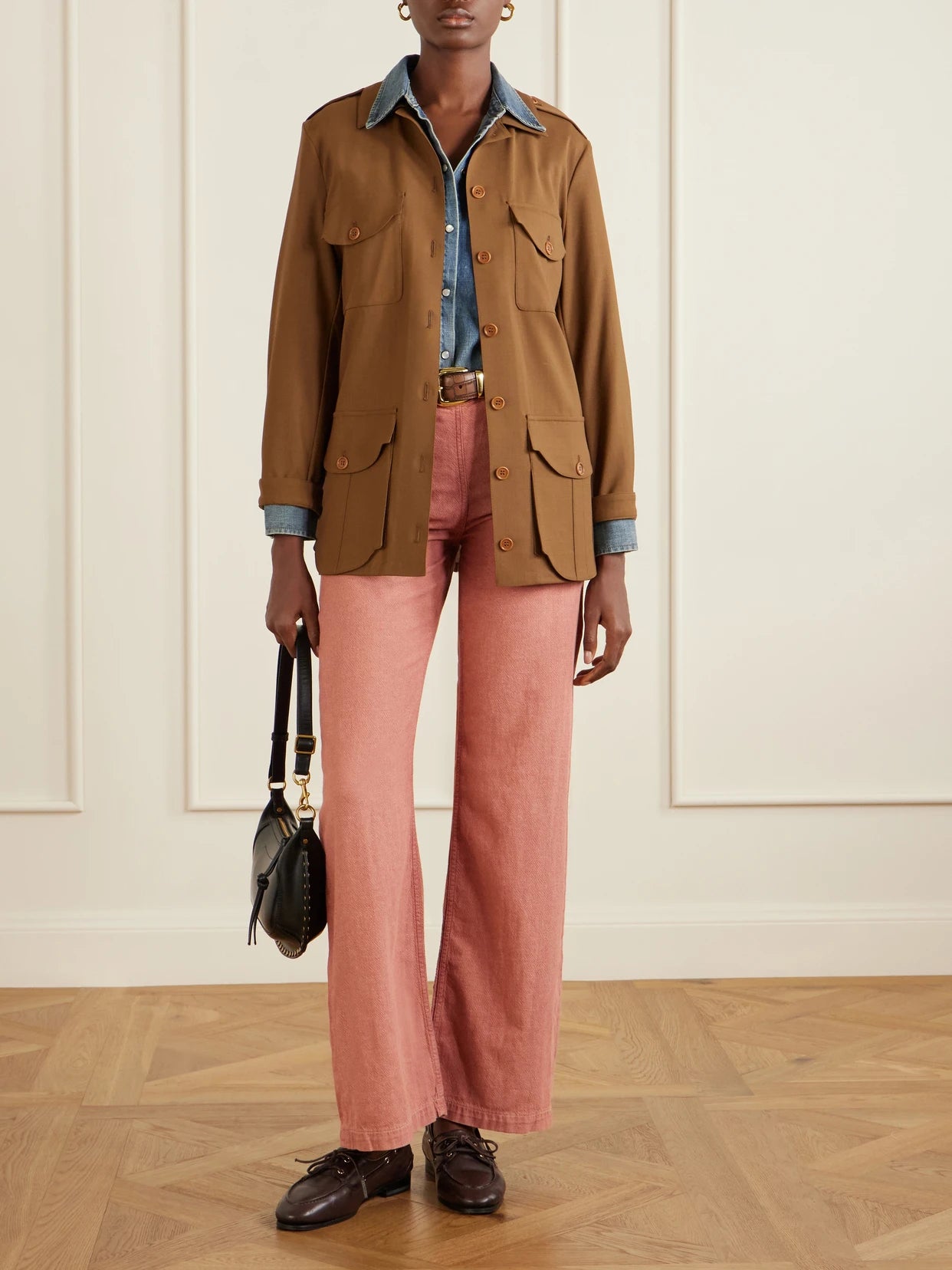 Image of a model wearing Pants. Product name - Billie Cotton And Linen-blend Flared Pants in Pink colour by brand - RRL