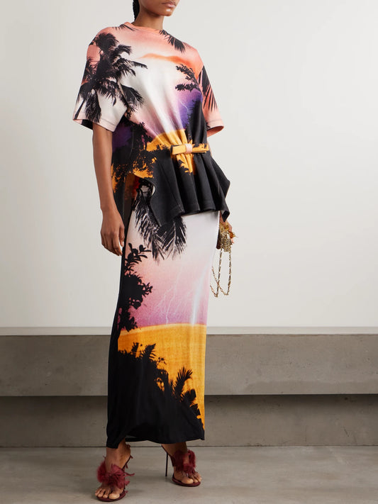 Image of a model wearing Tops. Product name - Bow-detailed Printed Gathered Jersey T-shirt in Multi colour by brand - RABANNE