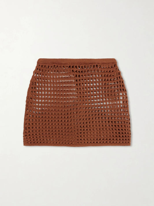 Image of a model wearing Skirts. Product name - Sheila Open-knit Cotton-blend Mini Skirt in Brown colour by brand - Haight