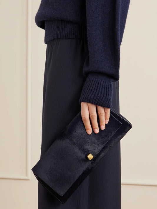 Image of Bags. Product name - Audrey Calf Hair Clutch in Navy colour by brand - KHAITE