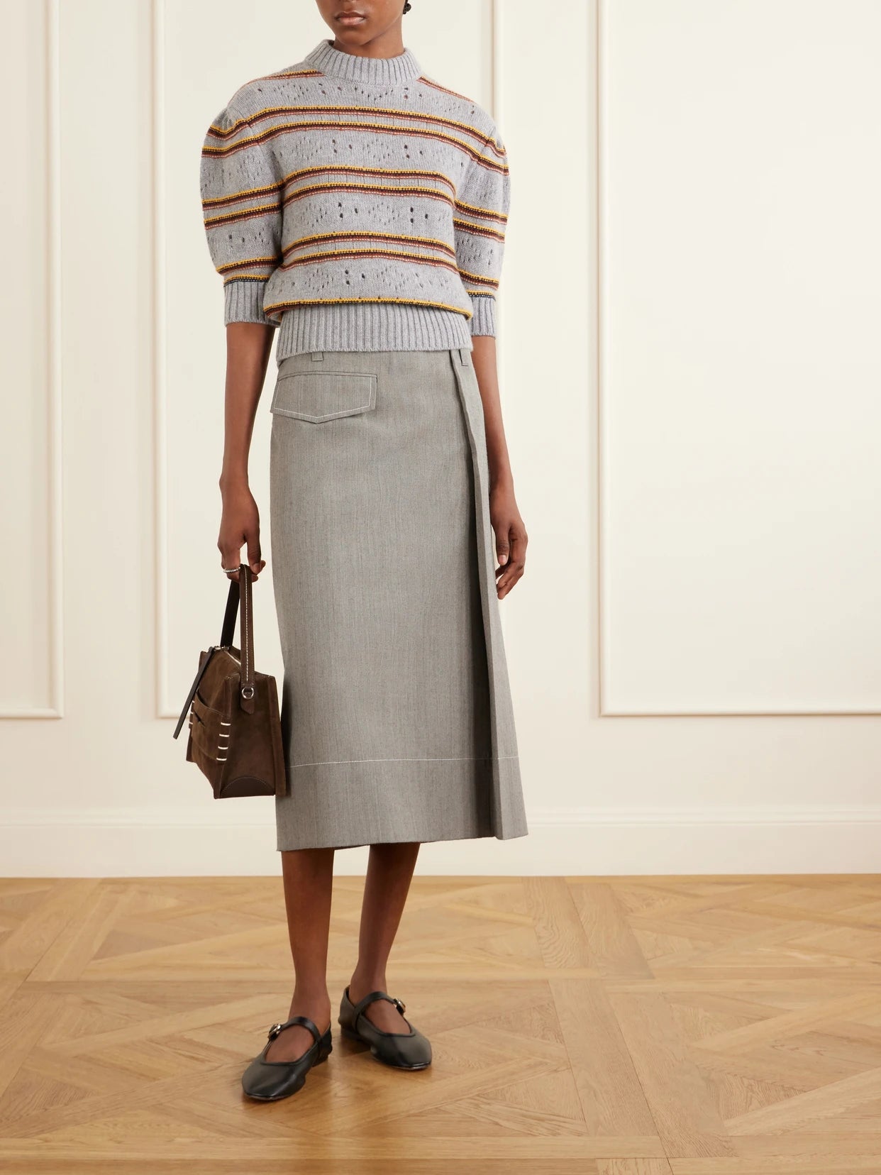 Image of a model wearing Skirts. Product name - Pleated Virgin-wool Midi Skirt in Gray colour by brand - Marni