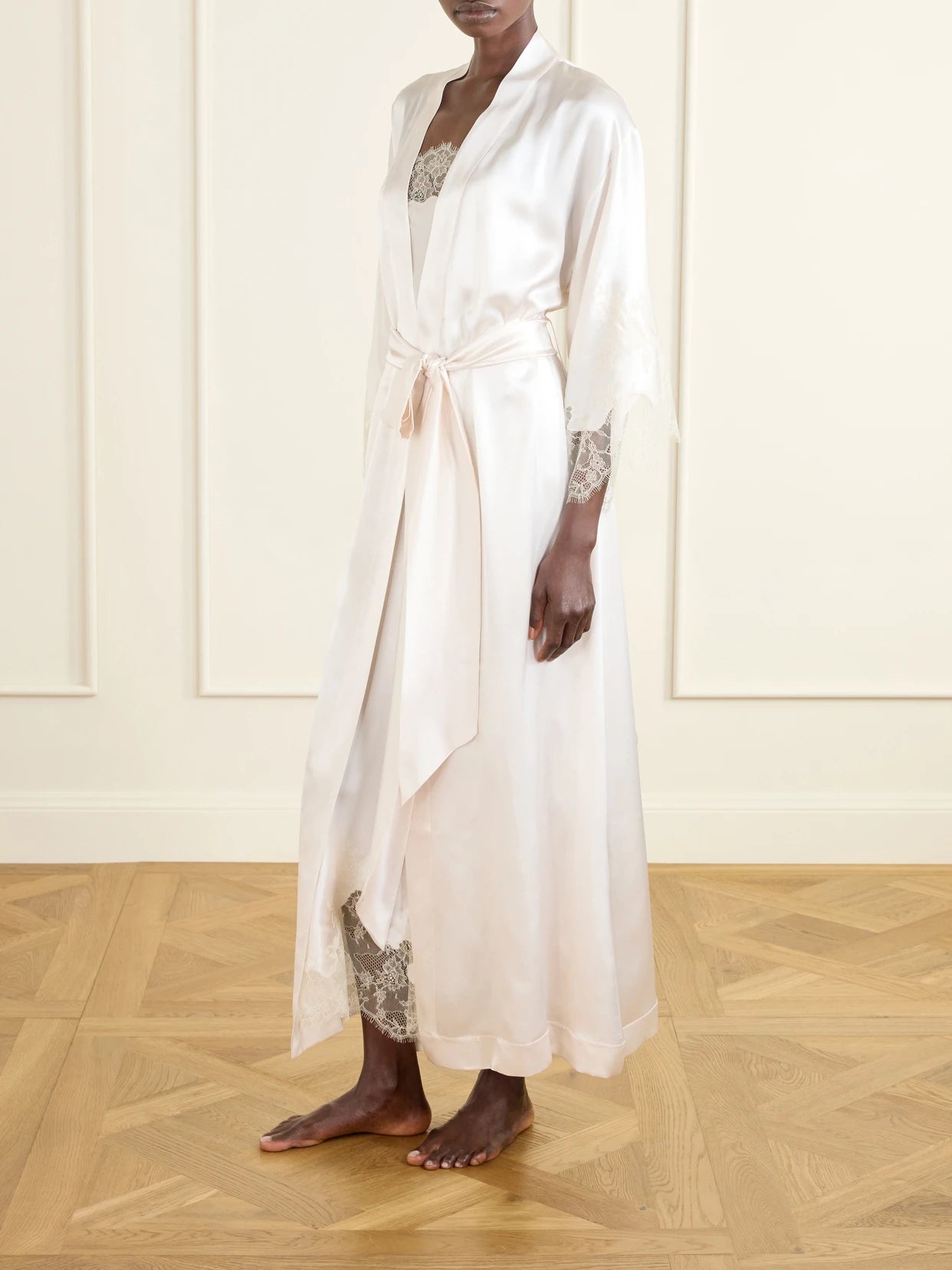 Image of Lingerie. Product name - Belted Lace-trimmed Silk-satin Robe in Ivory colour by brand - Carine Gilson