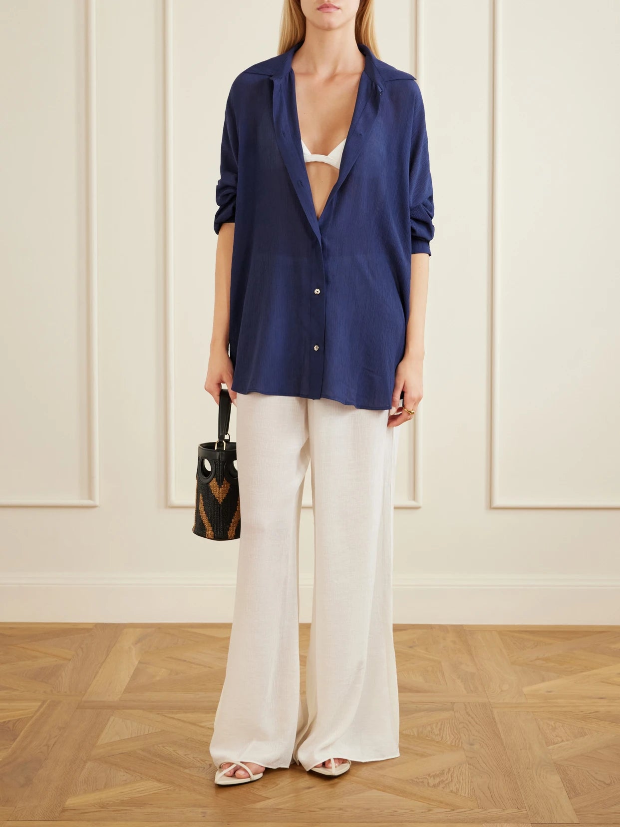 Image of a model wearing Tops. Product name - Maldives Crepon Shirt in Blue colour by brand - Away That Day
