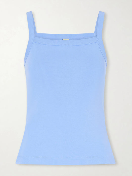 Image of a model wearing Tops. Product name - May Organic Cotton-jersey Tank Top in Blue colour by brand - FLORE FLORE