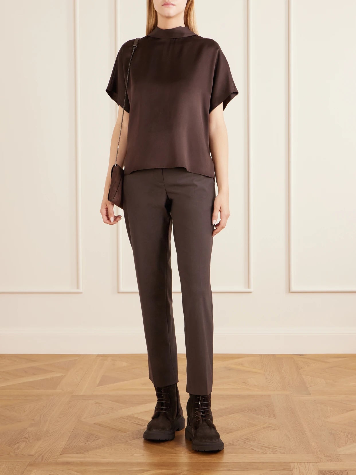 Image of a model wearing Tops. Product name - Draped Silk-satin Blouse in Dark brown colour by brand - Brunello Cucinelli