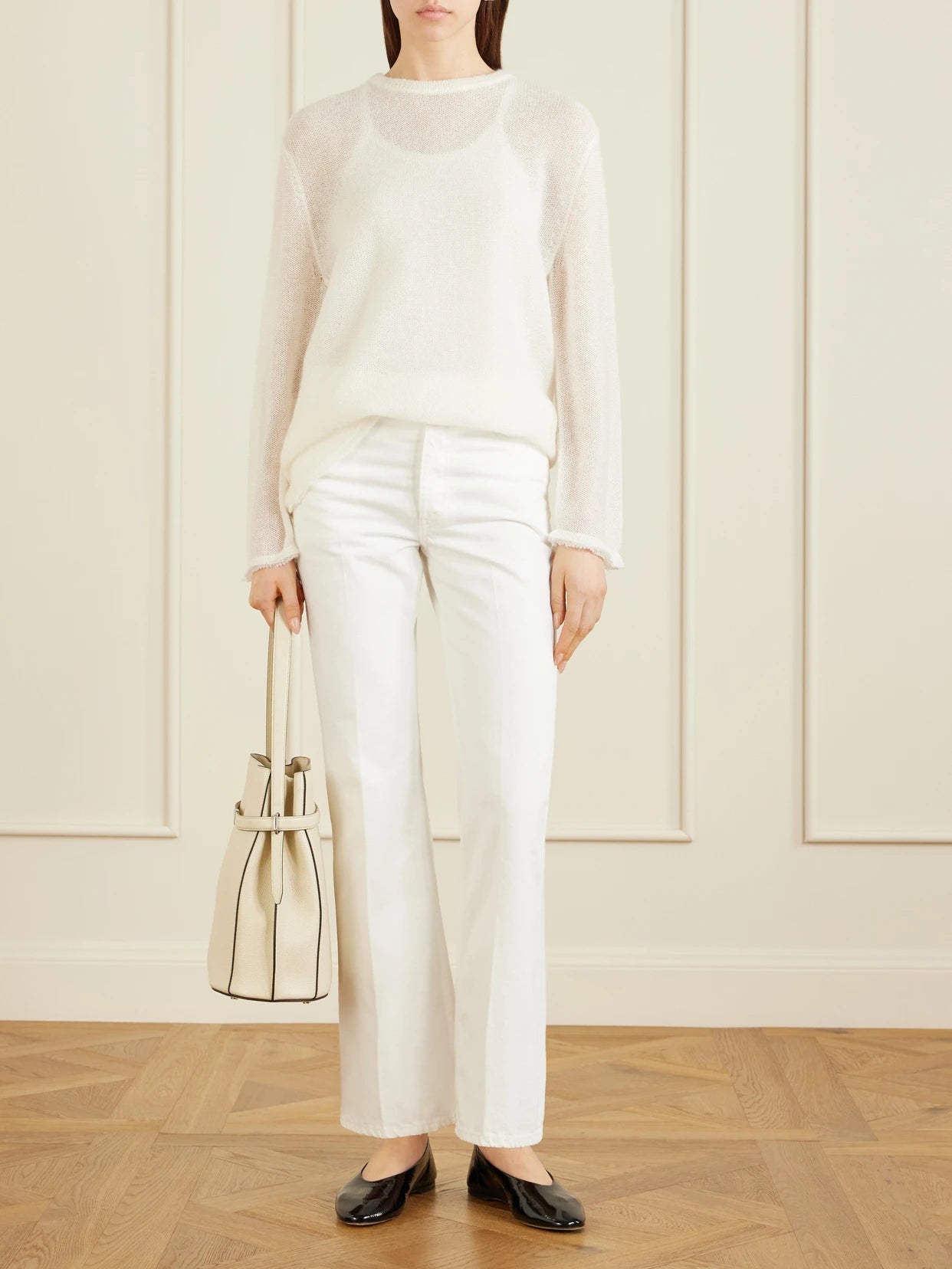 Image of a model wearing Outerwear. Product name - Mohair-blend Sweater in Off-white colour by brand - TOTEME