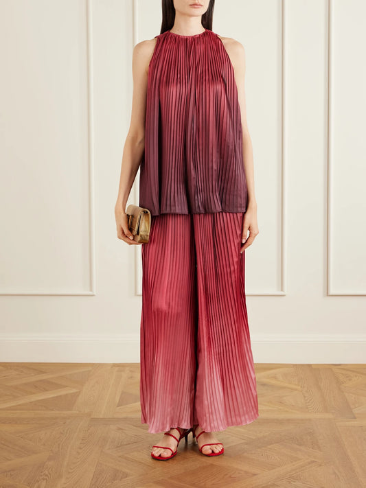 Image of a model wearing Tops. Product name - Ombré Plissé-taffeta Top in Burgundy colour by brand - Dima Ayad