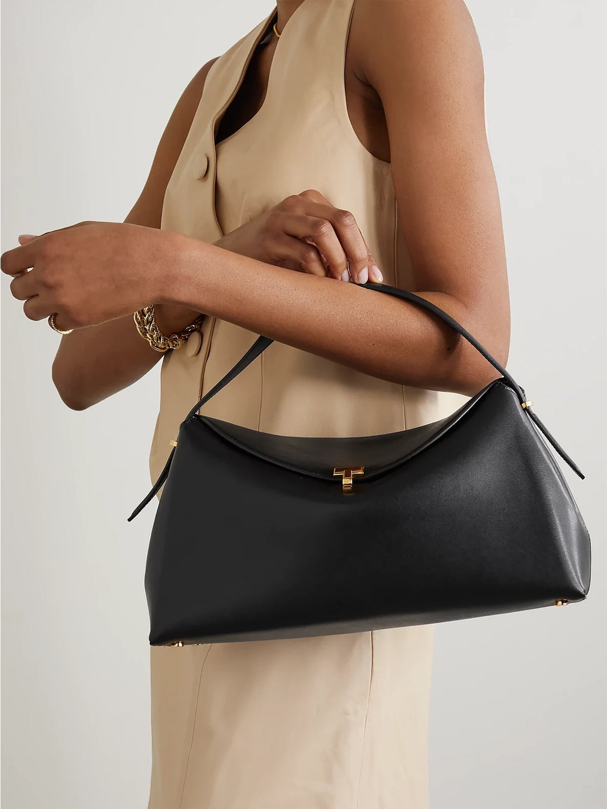 Image of Bags. Product name - T-lock Leather Shoulder Bag in Black colour by brand - TOTEME