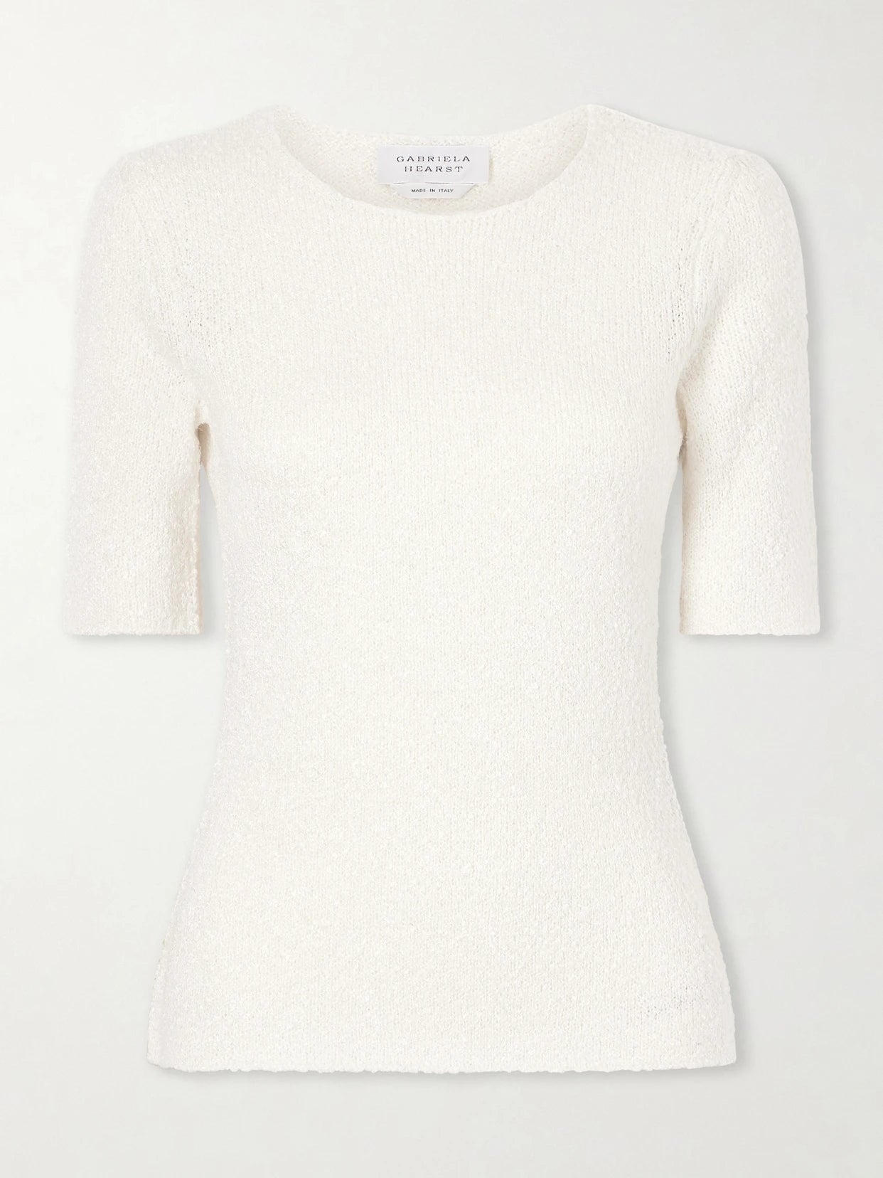 Image of a model wearing Outerwear. Product name - Valentia Knitted Silk T-shirt in Off-white colour by brand - Gabriela Hearst