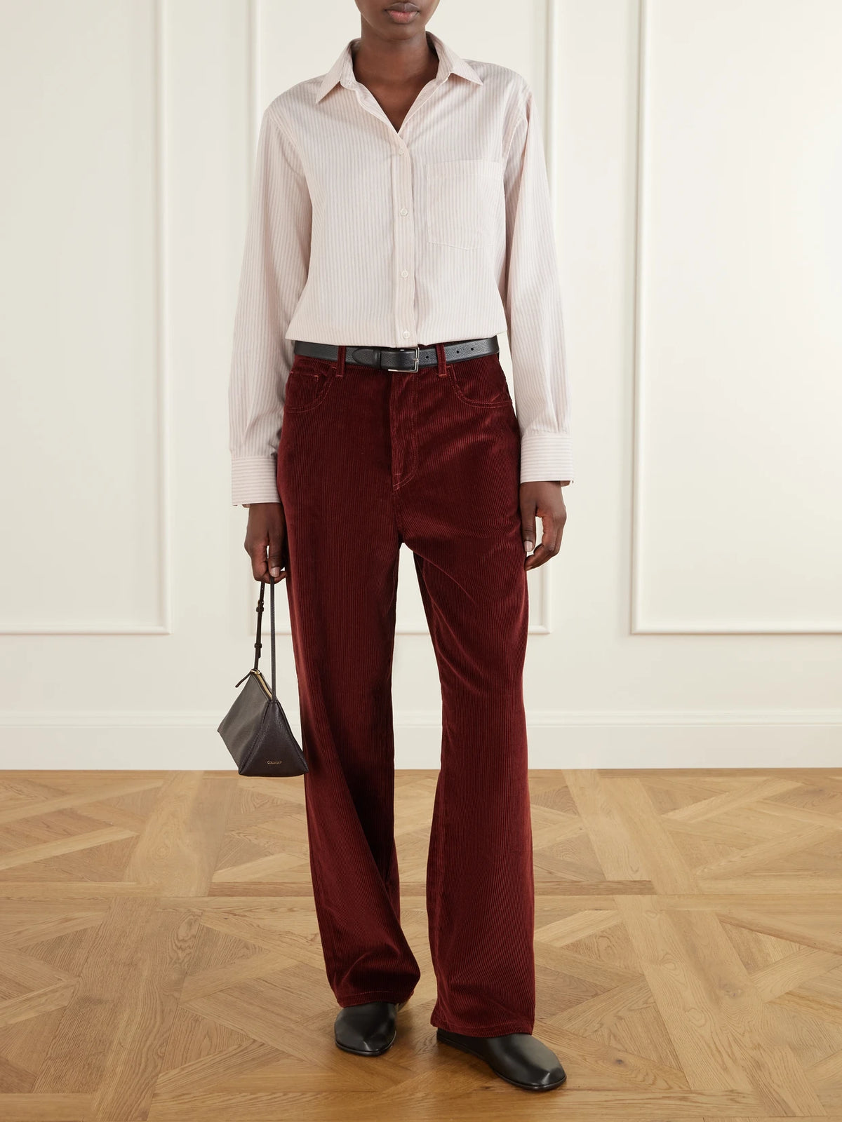 Image of a model wearing Tops. Product name - Striped Woven Shirt in Pink colour by brand - RÓHE