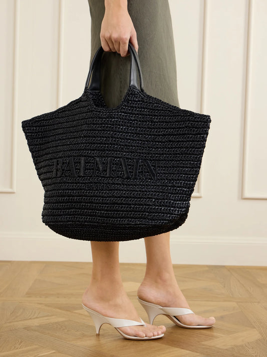 Image of Bags. Product name - Cabas Large Logo-embroidered Leather-trimmed Raffia Shoulder Bag in Black colour by brand - Balmain