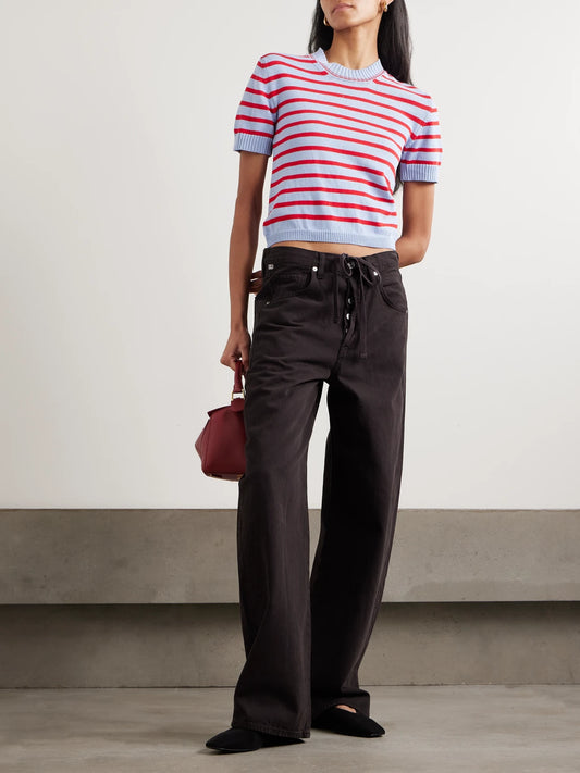 Image of a model wearing Outerwear. Product name - Shona Striped Organic Cotton Top in Blue colour by brand - &Daughter