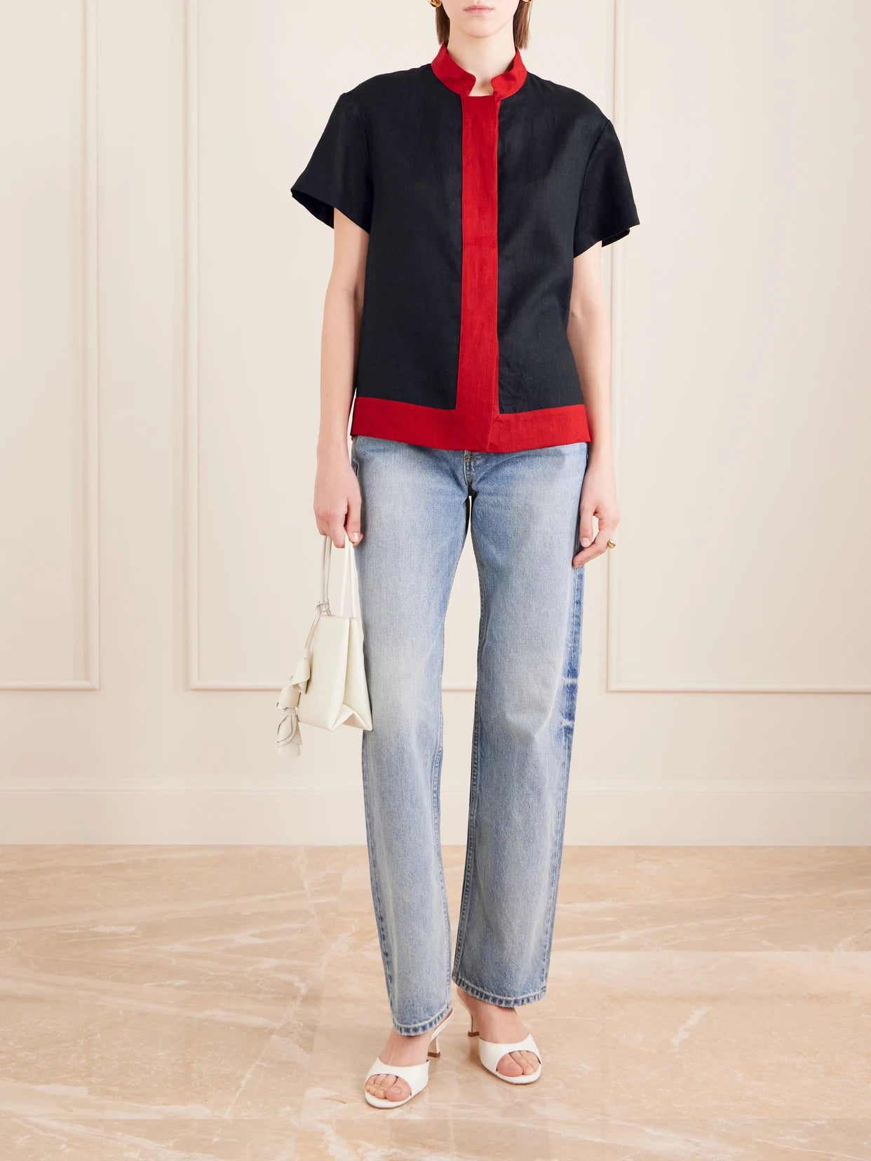 Image of a model wearing Tops. Product name - Hana Linen Shirt in Black colour by brand - LIBEROWE