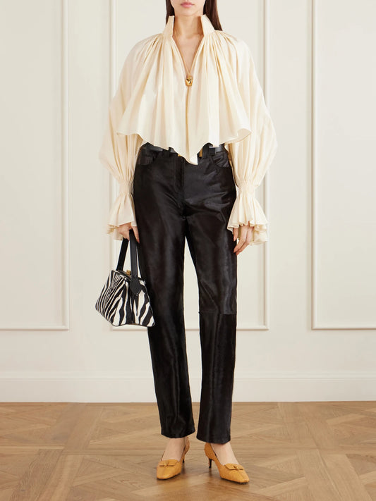 Image of a model wearing Pants. Product name - Callum Calf Hair Straight-leg Pants in Black colour by brand - KHAITE