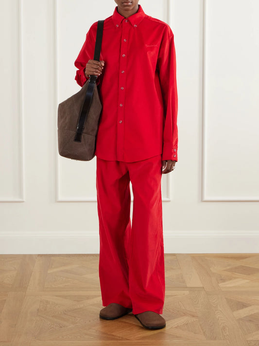 Image of a model wearing Tops. Product name - Cotton-corduroy Shirt in Red colour by brand - Sanderlak