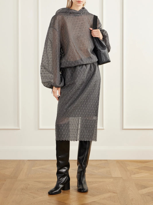 Image of a model wearing Skirts. Product name - Bria Scalloped Cotton-blend Floral-lace Midi Skirt in Gray colour by brand - Cecilie Bahnsen