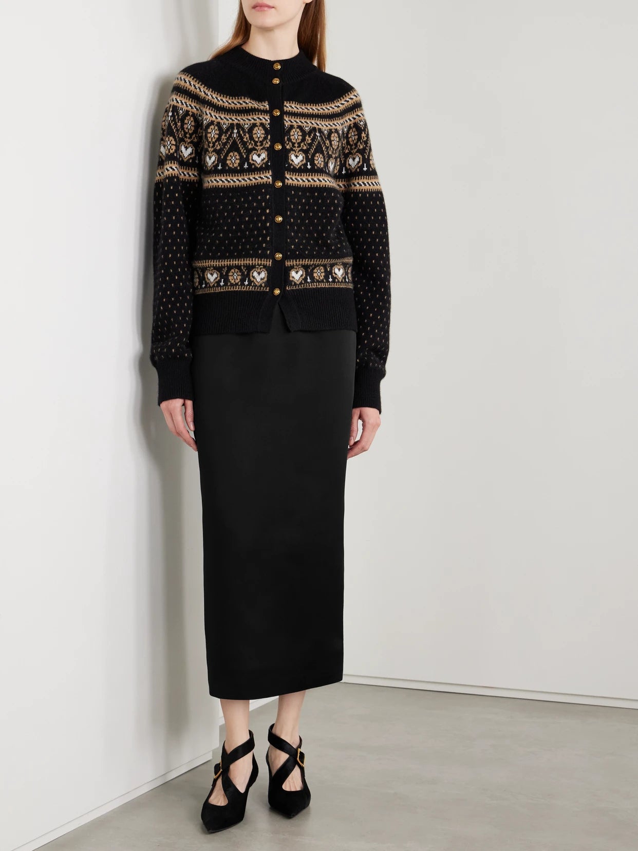 Image of a model wearing Skirts. Product name - Loxley Satin-crepe Maxi Skirt in Black colour by brand - KHAITE