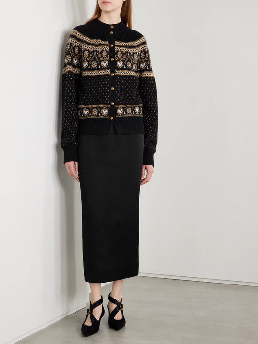 Image of a model wearing Skirts. Product name - Loxley Satin-crepe Maxi Skirt in Black colour by brand - KHAITE