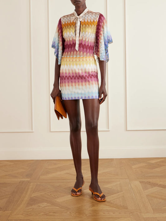 Image of a model wearing Skirts. Product name - Crochet-knit Mini Skirt in Red colour by brand - Missoni