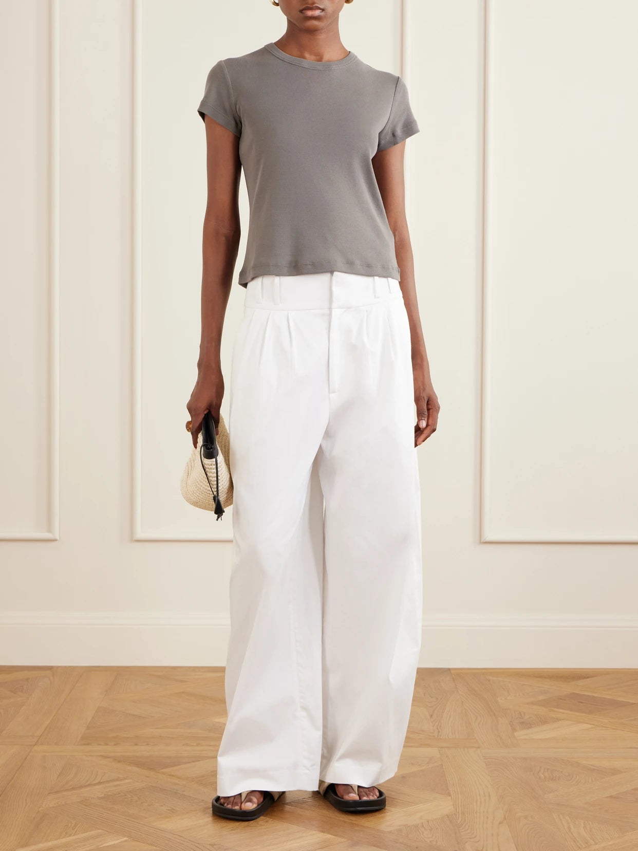 Image of a model wearing Tops. Product name - Baby Tee Organic Cotton-jersey T-shirt in Taupe colour by brand - ST. AGNI