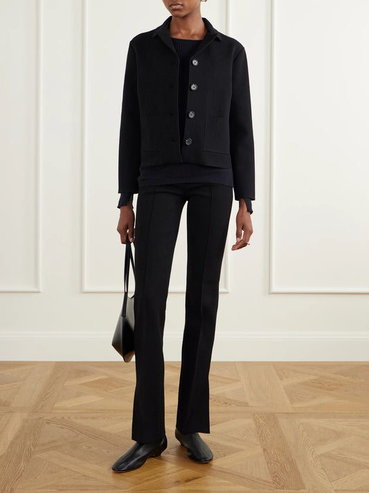 Image of a model wearing Outerwear. Product name - Bara Ribbed Cotton And Cashmere-blend Sweater in Black colour by brand - HIGH SPORT