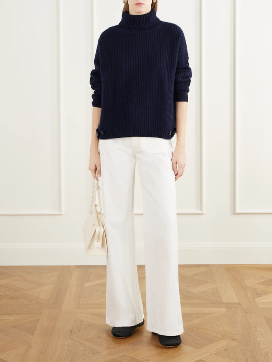 Image of a model wearing Outerwear. Product name - Ailis Ribbed Cashmere Turtleneck Sweater in Navy colour by brand - LISA YANG