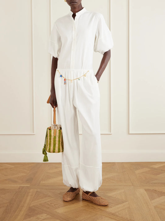 Image of a model wearing Pants. Product name - Embellished Cotton-crepe Balloon Pants in White colour by brand - Stella McCartney
