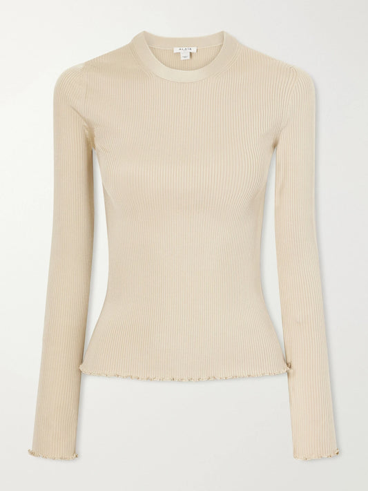 Image of a model wearing Tops. Product name - Ribbed Silk-blend Top in Ecru colour by brand - Alaïa