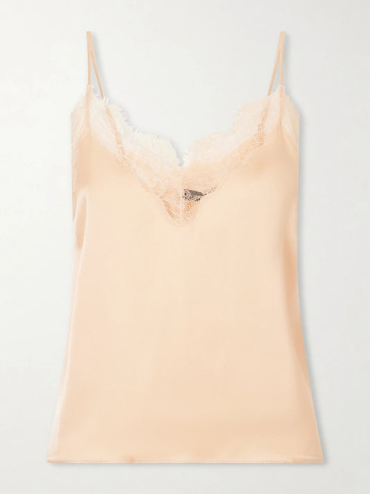 Image of a model wearing Tops. Product name - Mael Lace-trimmed Silk-blend Blouse in Baby pink colour by brand - Anine Bing