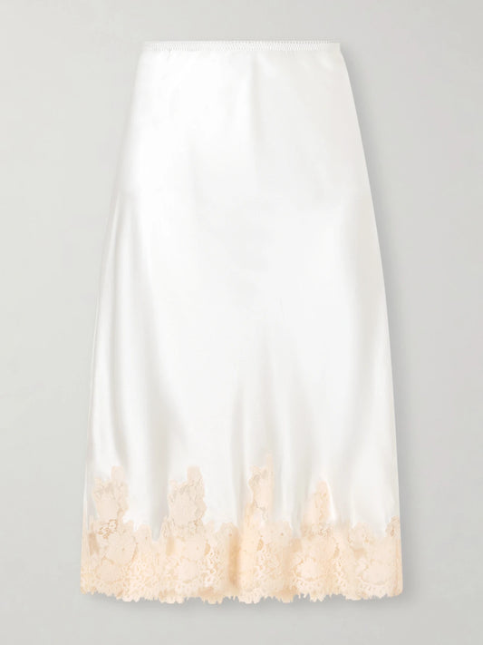 Image of a model wearing Skirts. Product name - Elowette Lace-trimmed Silk-satin Midi Skirt in White colour by brand - DÔEN