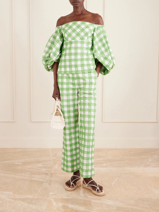 Image of a model wearing Pants. Product name - Easy Does It Checked Cotton Straight-leg Pants in Green colour by brand - Rosie Assoulin