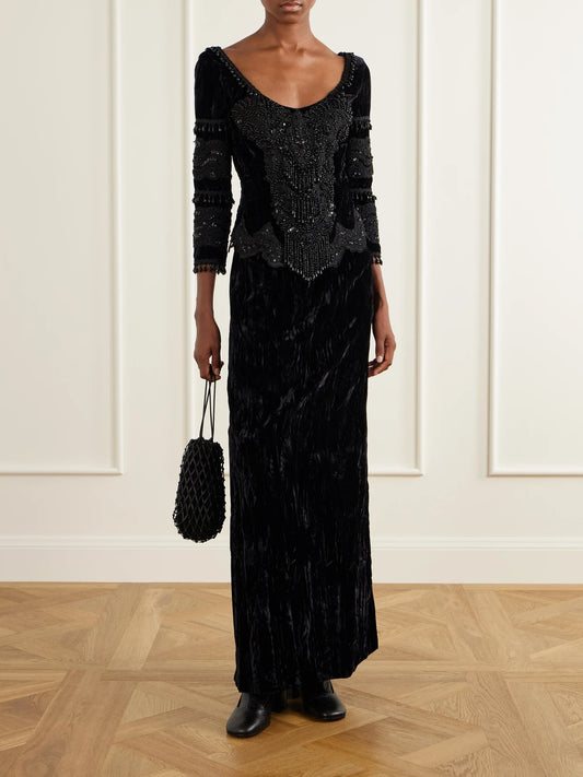 Image of a model wearing Skirts. Product name - Velvet Maxi Skirt in Black colour by brand - Anna Sui