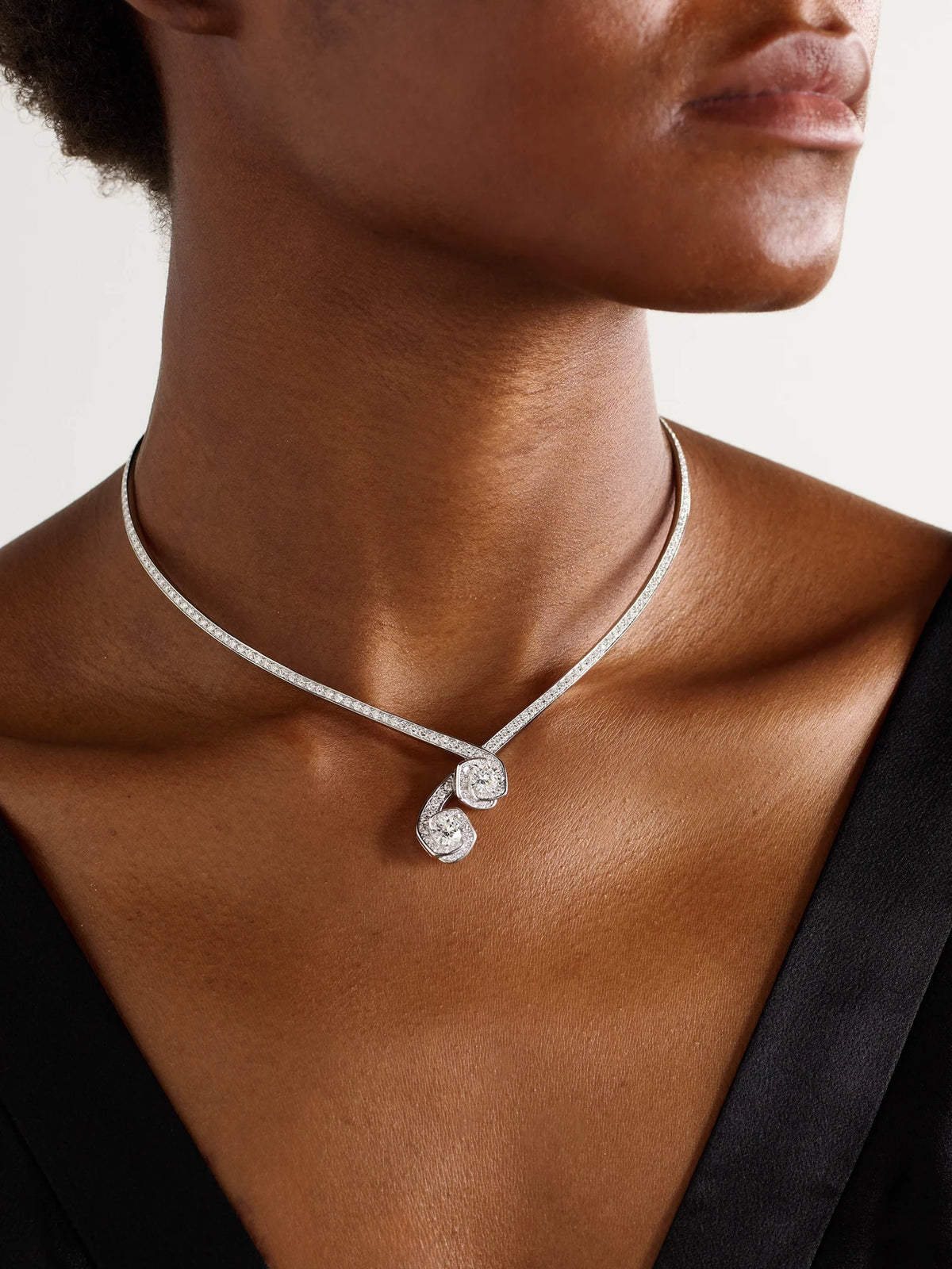 Image of Necklaces. Product name - Frozen Kiss Torque 18-karat White Gold Diamond Necklace in Multi colour by brand - David Morris