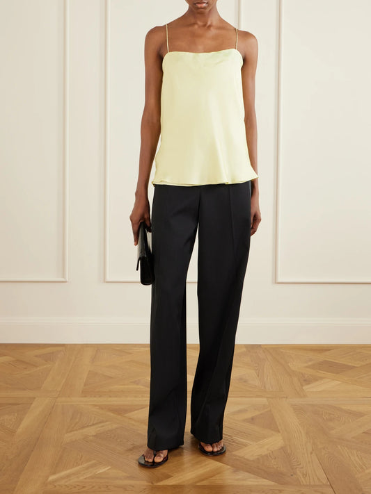 Image of a model wearing Tops. Product name - Silk-twill Camisole in Yellow colour by brand - Another Tomorrow