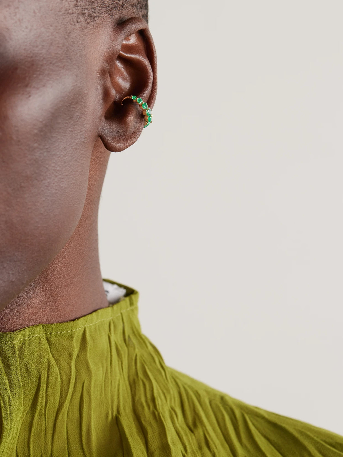 Image of Earrings. Product name - 18-karat Gold Emerald Ear Cuff in Green colour by brand - SHAY