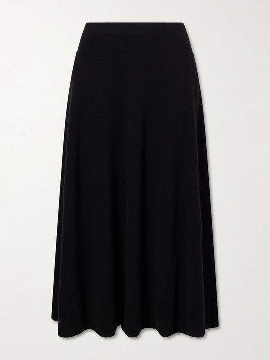 Image of a model wearing Skirts. Product name - Masini Cashmere-blend Midi Skirt in Black colour by brand - The Row