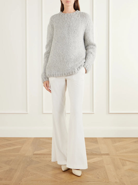 Image of a model wearing Outerwear. Product name - Lawrence Rib-trimmed Cashmere Sweater in Light gray colour by brand - Gabriela Hearst