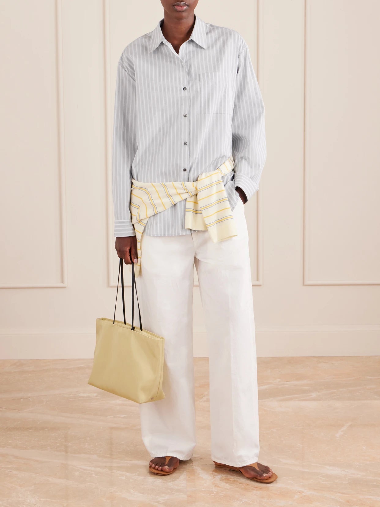Image of a model wearing Tops. Product name - Yoshi Striped Cotton-blend Shirt in Light blue colour by brand - LESET