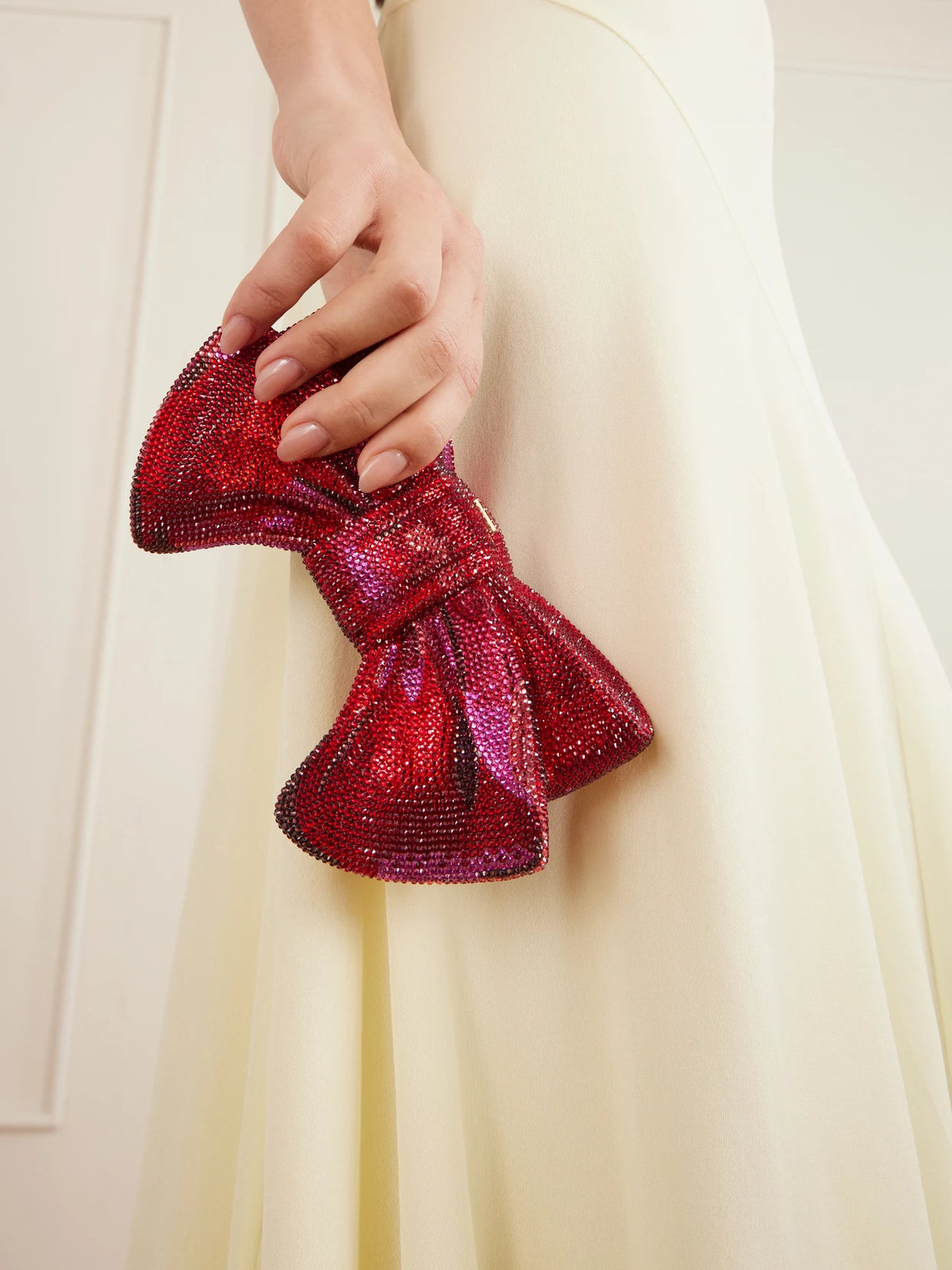 Image of Bags. Product name - Bow Just For You Crystal-embellished Gold-tone Clutch in Red colour by brand - Judith Leiber Couture