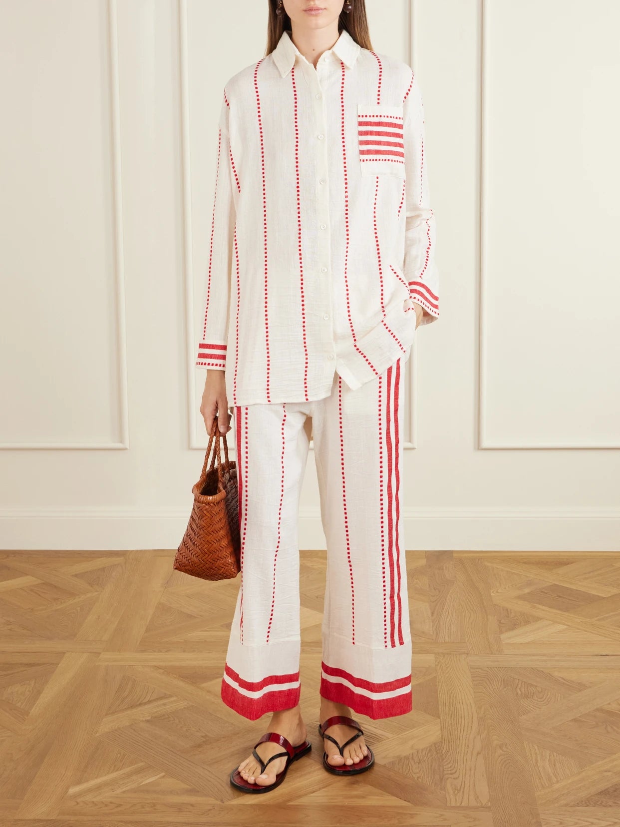 Image of a model wearing Tops. Product name - Mariam Cotton-gauze Shirt in Red colour by brand - lemlem