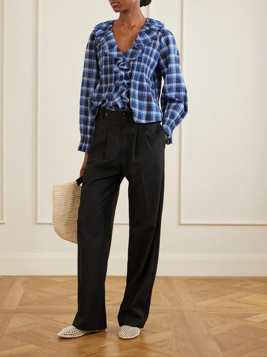 Image of a model wearing Pants. Product name - Olivia Poplin Wide-leg Pants in Black colour by brand - DÔEN