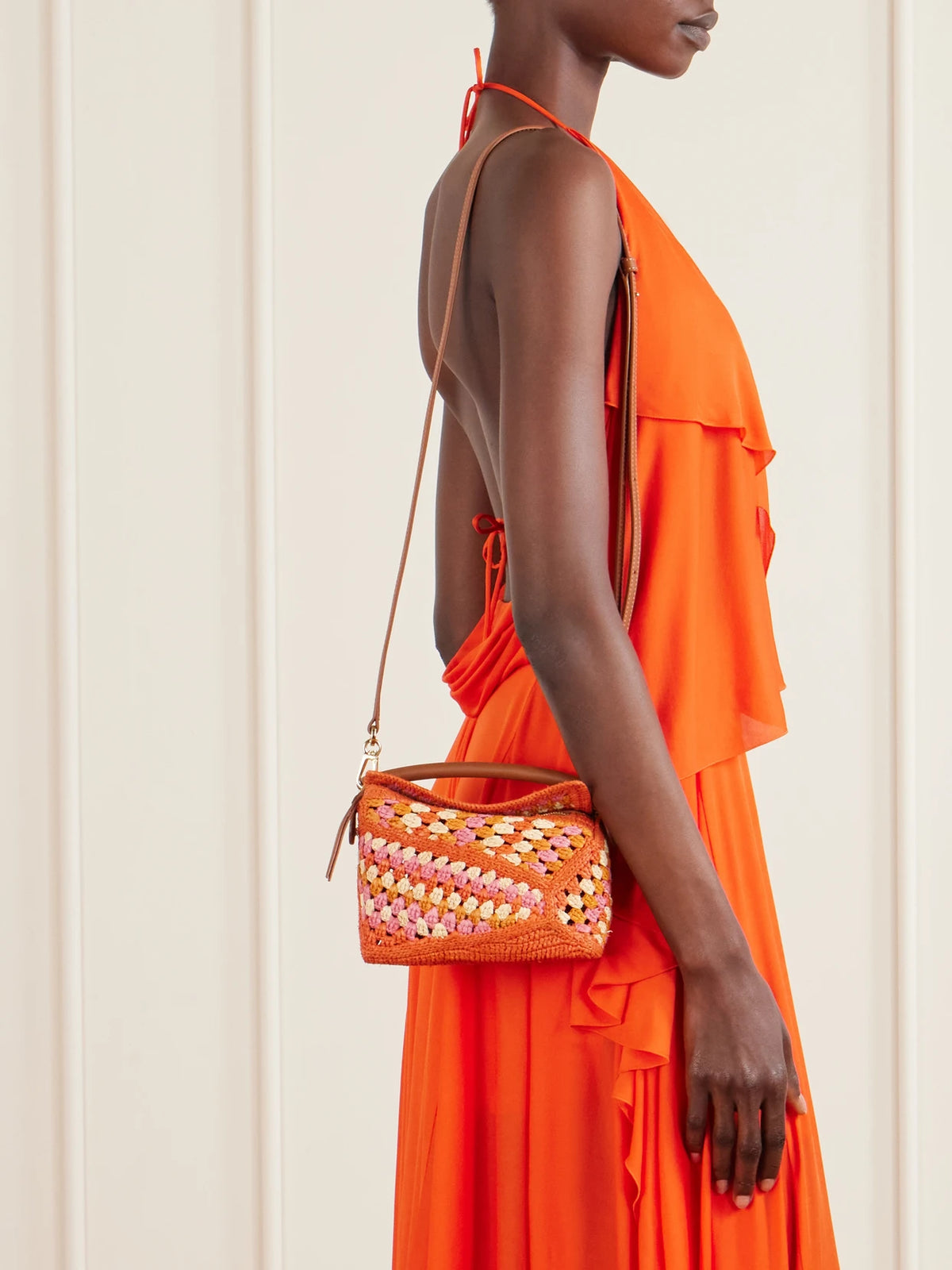 Image of Bags. Product name - + Paula's Ibiza Puzzle Edge Mini Leather-trimmed Crocheted Raffia Shoulder Bag in Bright orange colour by brand - LOEWE