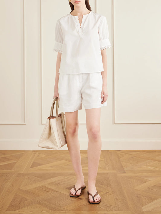 Image of a model wearing Tops. Product name - Keepsake Popover Camp-collar Cotton Blouse in White colour by brand - FRAME