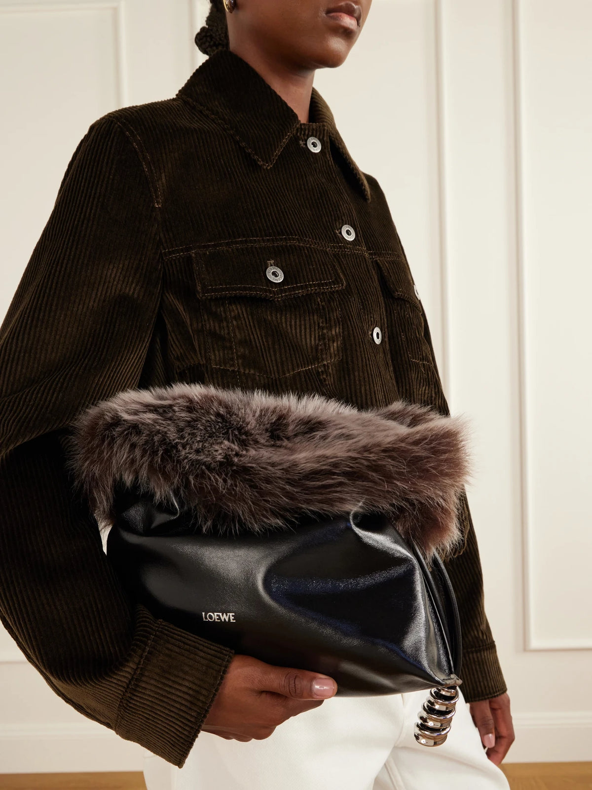 Image of Bags. Product name - Flamenco Medium Shearling-trimmed Leather Clutch in Black colour by brand - LOEWE