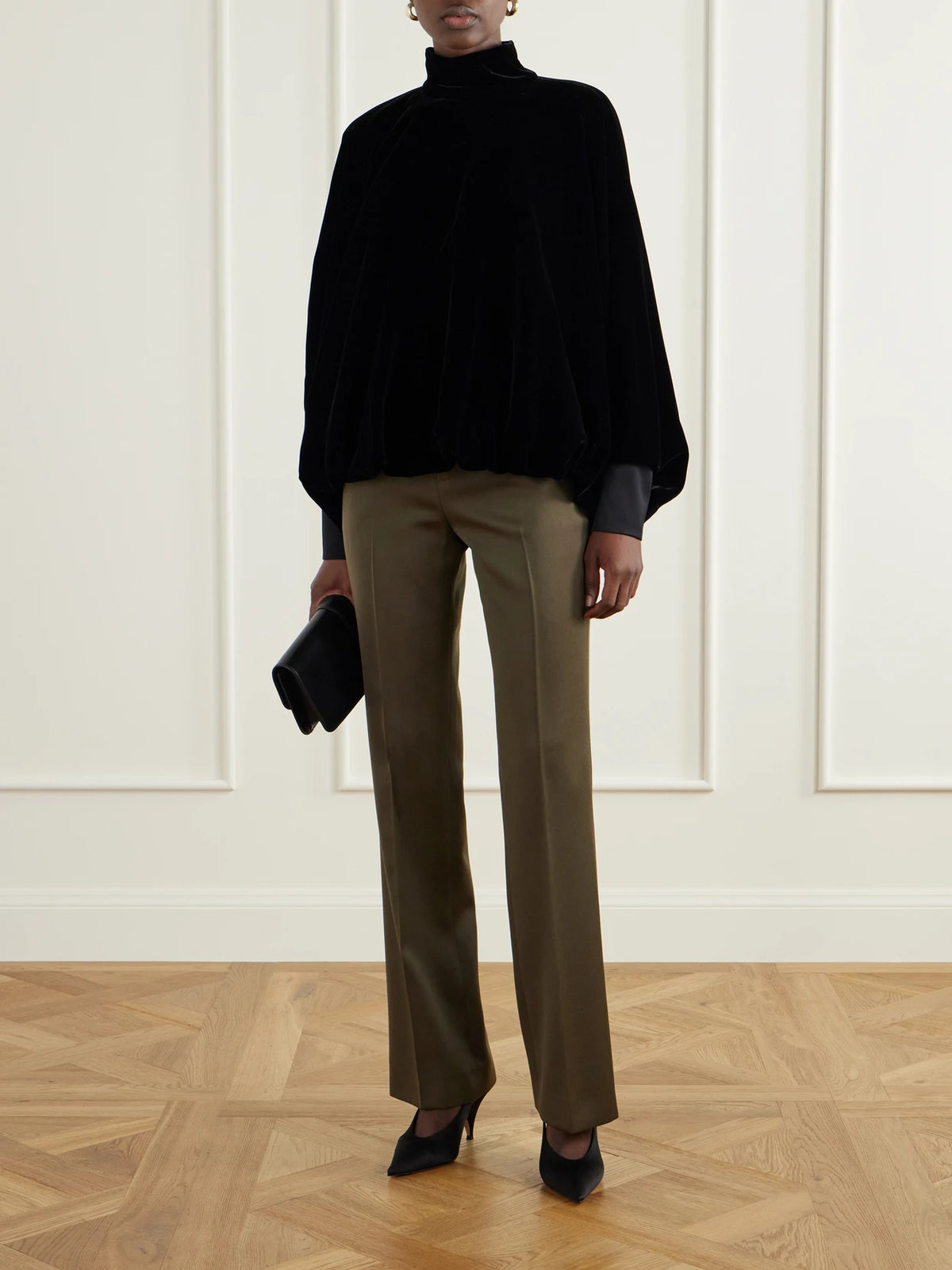 Image of a model wearing Pants. Product name - Wool Straight-leg Pants in Dark green colour by brand - Balmain
