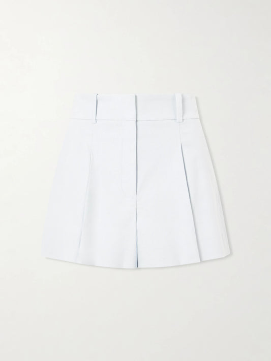 Image of a model wearing Shorts. Product name - Craig Pleated Cotton-blend Twill Shorts in Light blue colour by brand - Veronica Beard