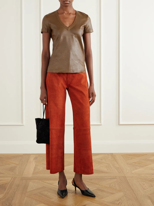 Image of a model wearing Tops. Product name - Gigi Leather T-shirt in Brown, Black colour by brand - STOULS