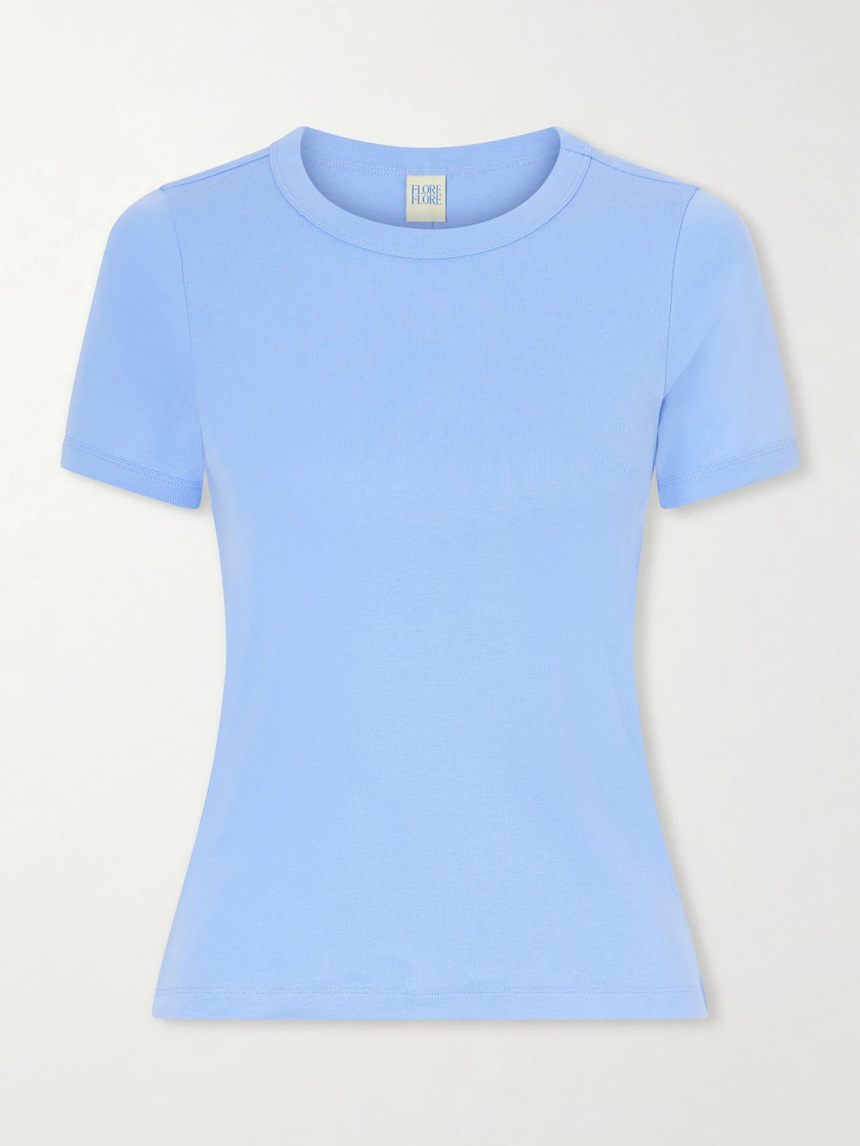 Image of a model wearing Tops. Product name - Car Ribbed Organic Cotton-jersey T-shirt in Blue colour by brand - FLORE FLORE