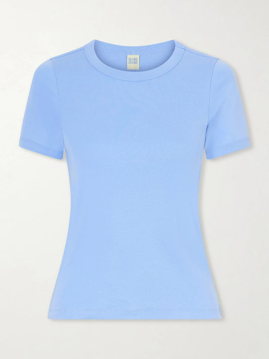 Image of a model wearing Tops. Product name - Car Ribbed Organic Cotton-jersey T-shirt in Blue colour by brand - FLORE FLORE