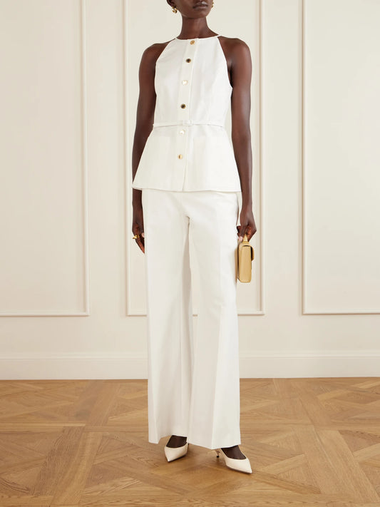 Image of a model wearing Tops. Product name - Belted Cotton-blend Blouse in White colour by brand - Carolina Herrera